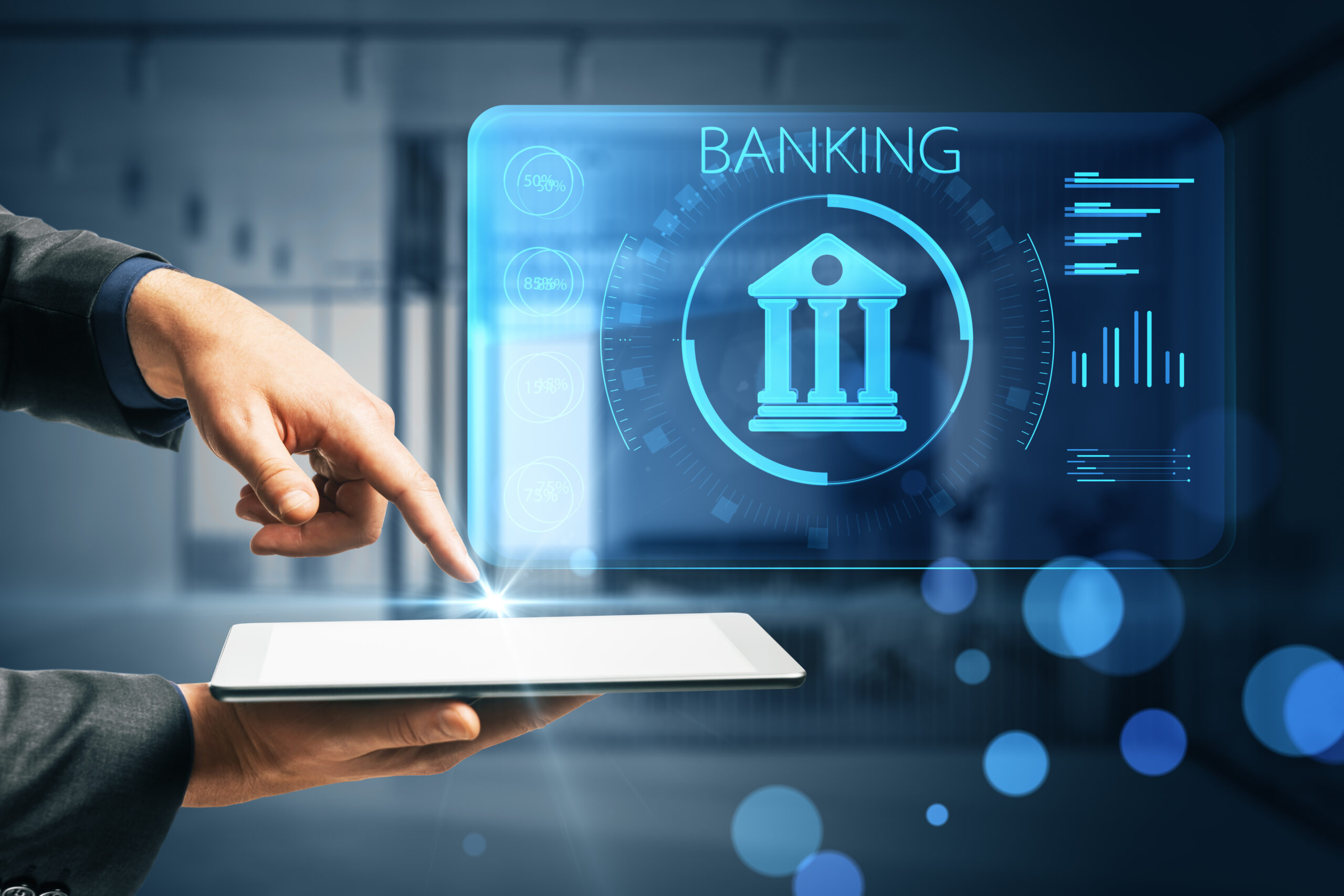 Businessman hand pointing at tablet with creative online banking hologram on blue blurry background AI and automation concept Double exposure • Elementor Hosted Website Businessman hand pointing at tablet with creative online banking hologram on blue blurry background AI and automation concept Double exposure