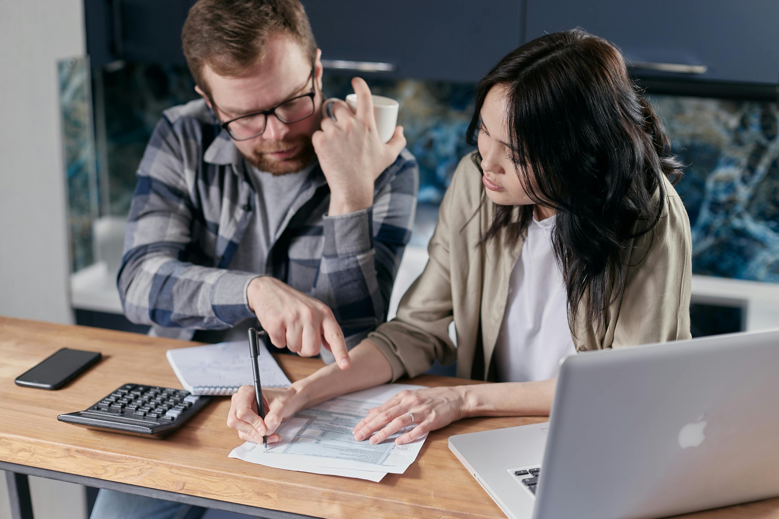 8-Strategies-for-Tackling-Technical-Debt-at-Your-Company-scaledjpg • Elementor Hosted Website Free couple calculating al their bills stock photo